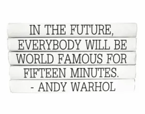 "IN THE FUTURE, EVERYBODY WILL BE WORLD FAMOUS FOR FIFTEEN MINUTES." Quote Book Stack